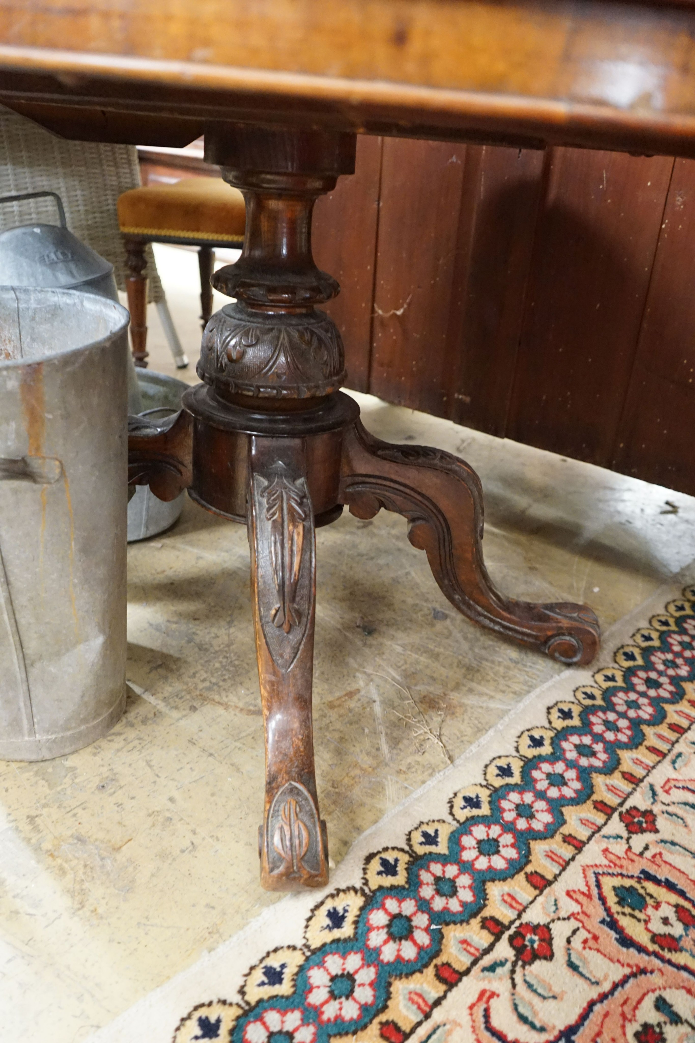 A Victorian oval burr walnut tilt top loo table, length 134cm, width 100cm, height 72cm